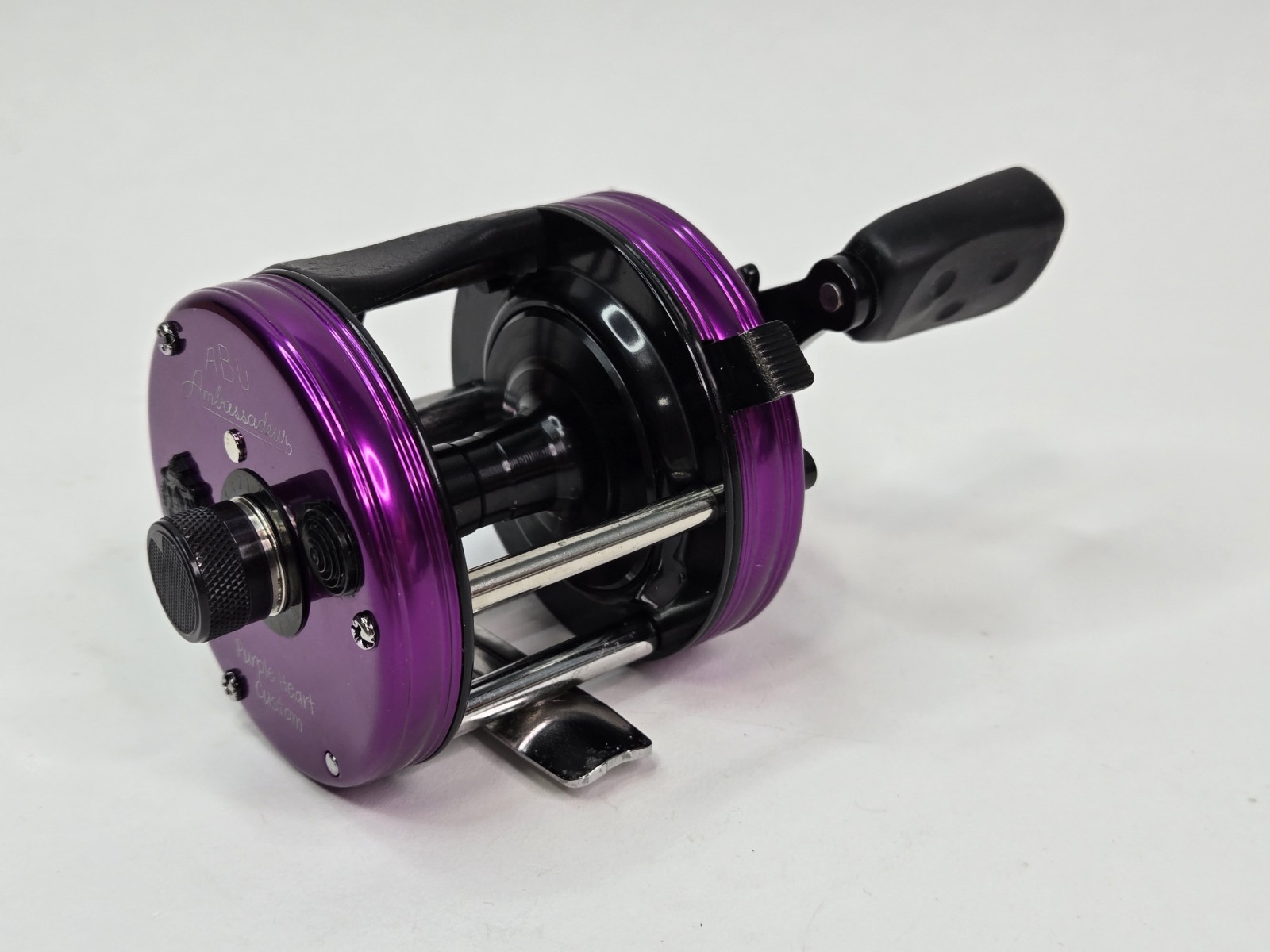 Abu Garcia Ambassadeur 5500 CS Rocket Reel – Purple Heart Custom