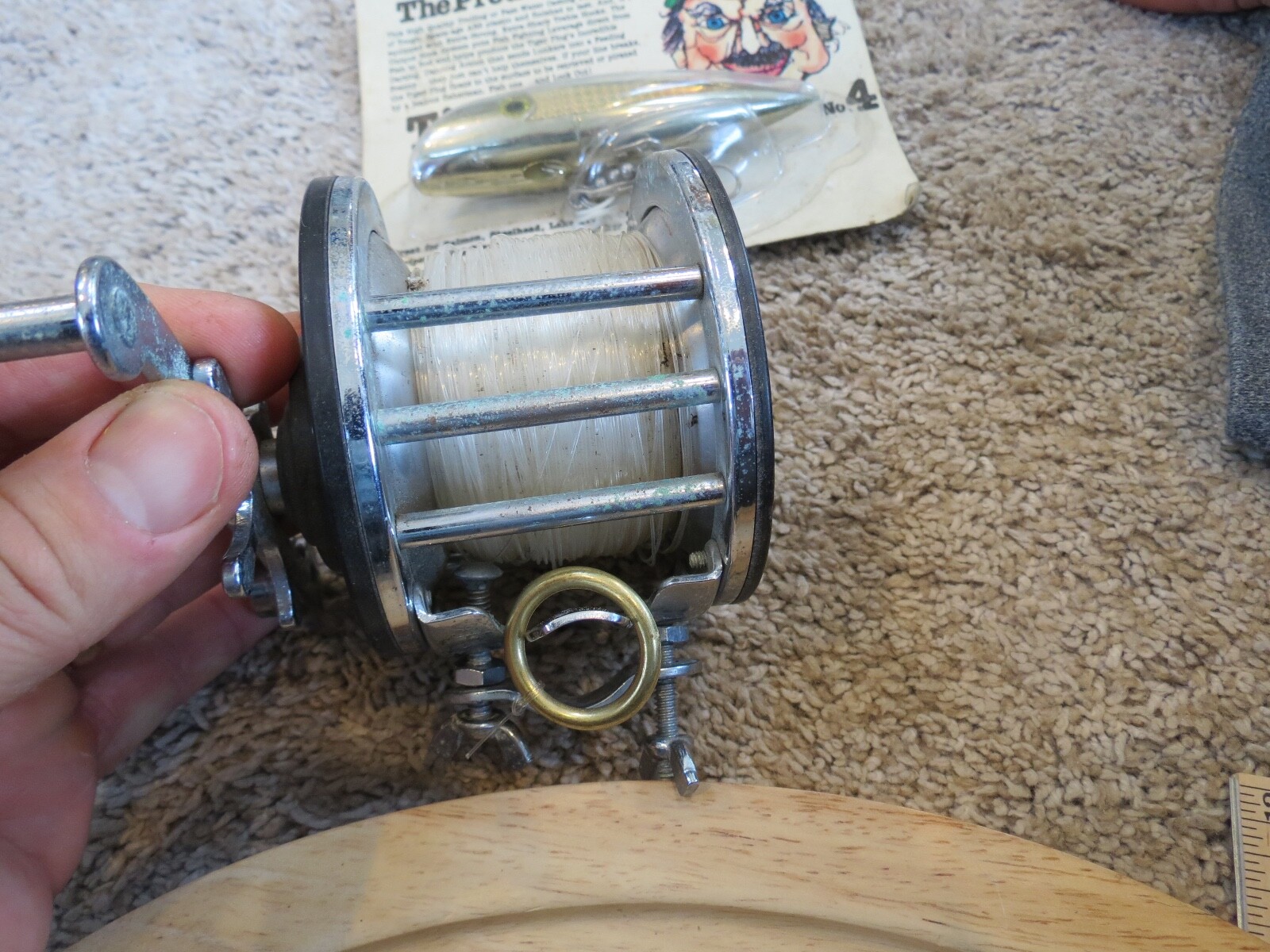 Penn 66 Saltwater fishing reel with 40lb line & fishing lure (lot#14586)