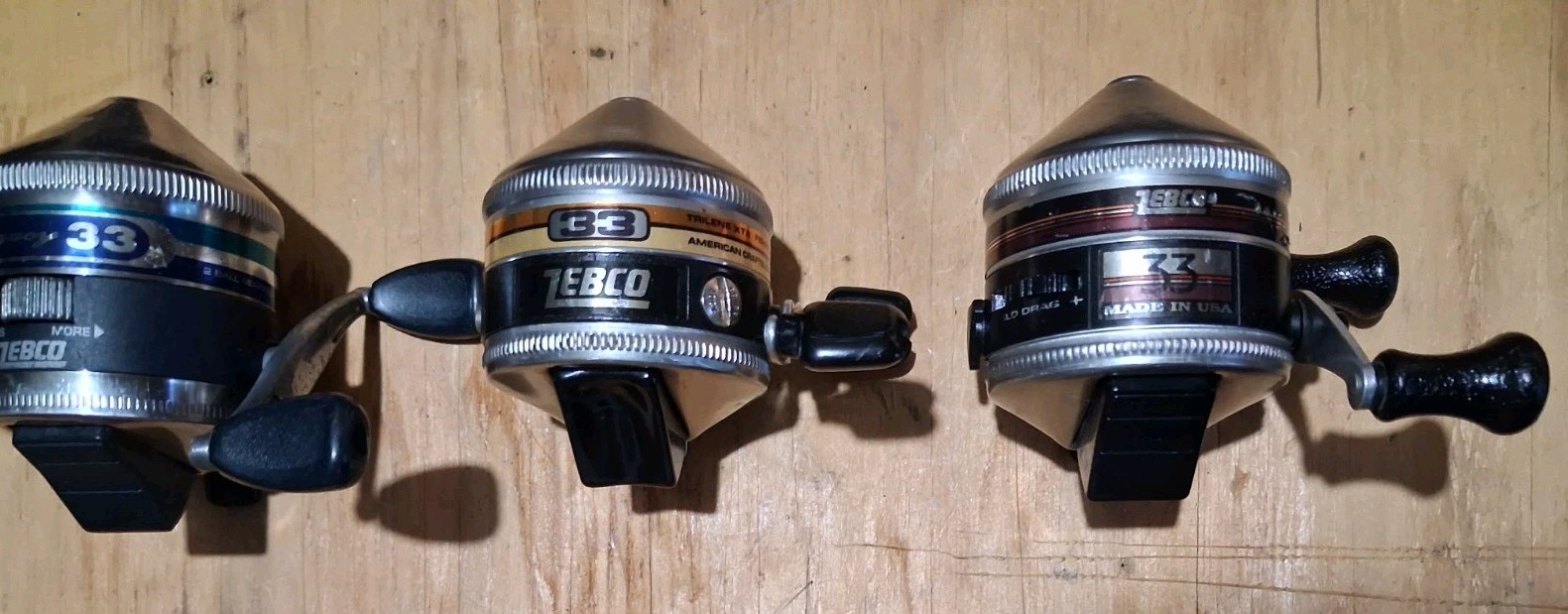 3 Zebco 33 Spincast Fishing Reels Legacy, Orange , Purple Band