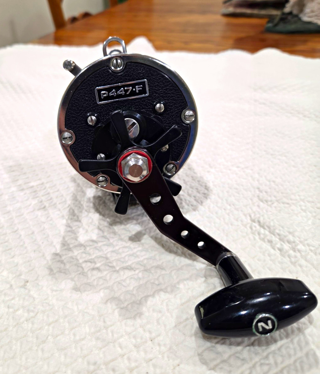 Newell P-447-F Conventional Reel 1BB Star Drag Right
