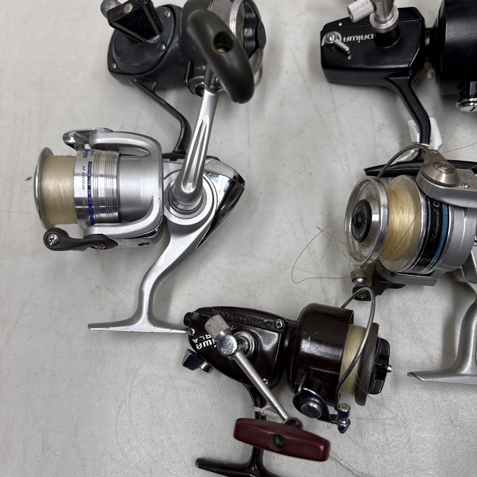 Lot Of 14 Shimano, Daiwa,Pflueger, Shakespeare,South bend Fishing Reels Untested