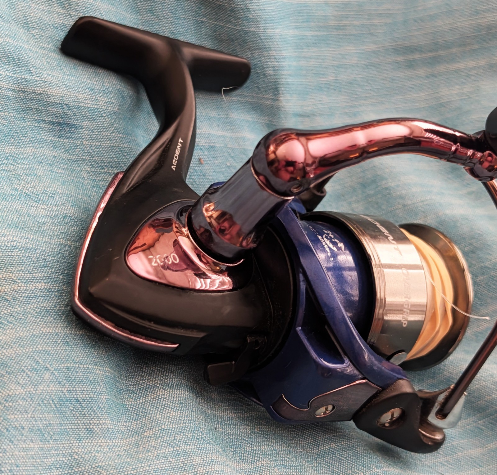PRE-OWNED ARDENT 2000 OVERGRIP HIGH-SPEED PERFORMANCE SPINNING REEL 6.2:1
