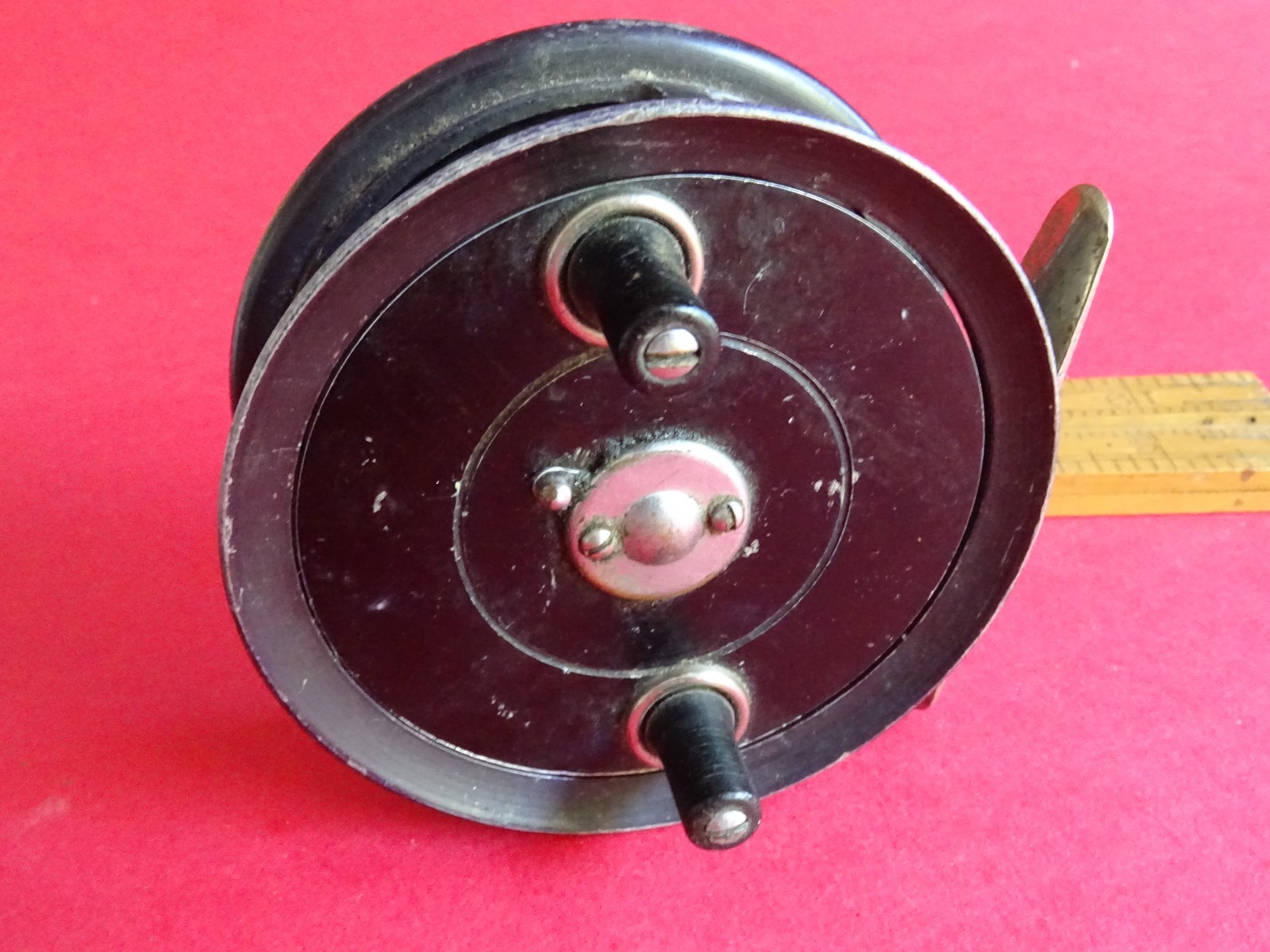 A USEABLE VINTAGE 3 9/16″ COMPETITOR CENTREPIN FISHING REEL