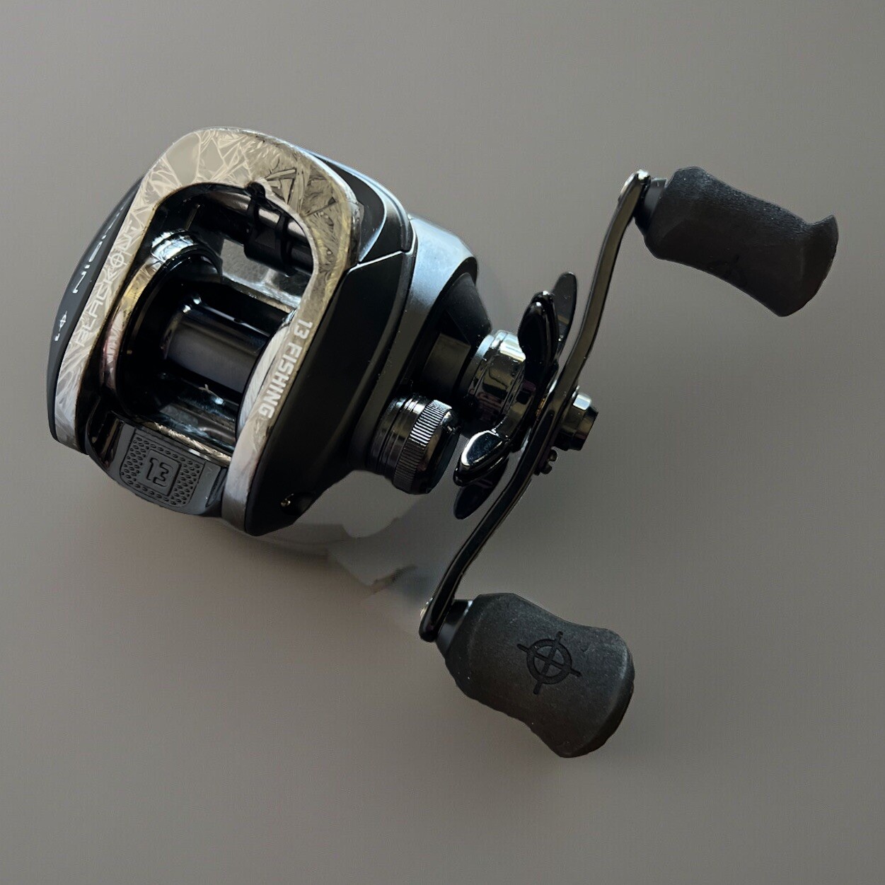 13 Fishing Origin O1 Baitcast Fishing Reel – Black (OBO173RH)