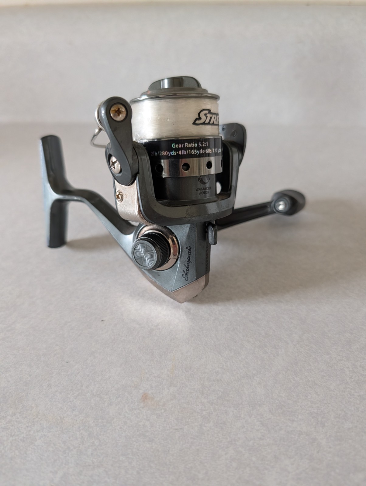 Shakespeare Micro Series Spinning Fishing Reel. Model MS2SP20. Factory Prestrung