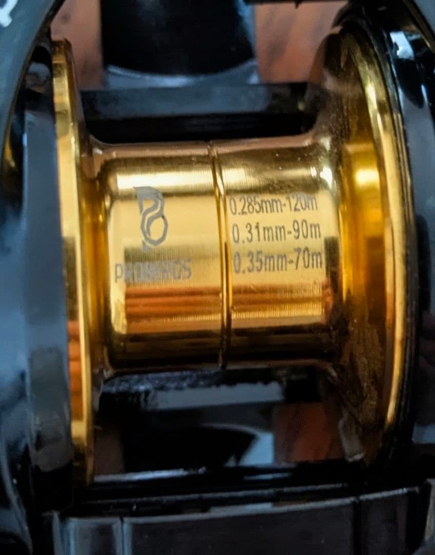 PROBEROS Japanese pattern double-shaft reel black & gold unused left-hand