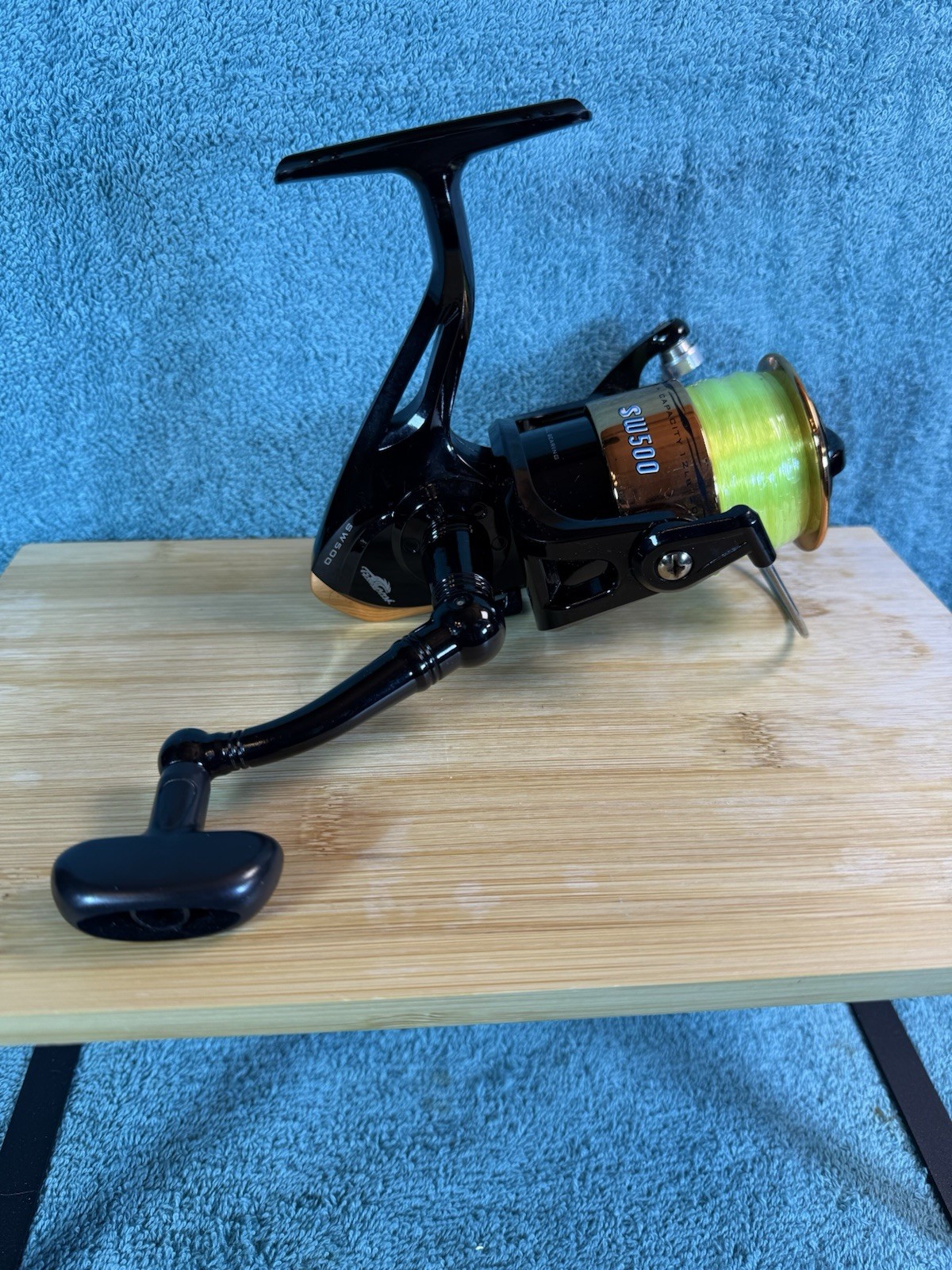 Tsunami SW500 Fishing Reel Gold & Black LONG CAST 10LB 220 YDS USED