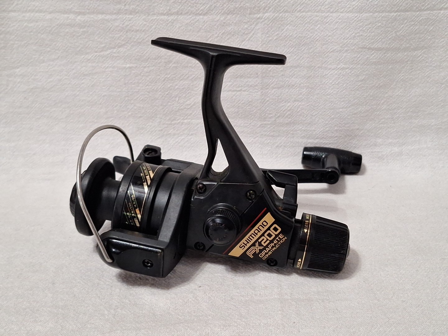 Shimano FX 200 Quick Fire R2 Graphite Construction Left Or Right Hand Retrieve